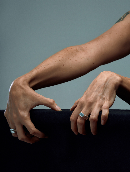 Model wearing handcrafted Indigo silver jewelry from the whispered Whisper tale