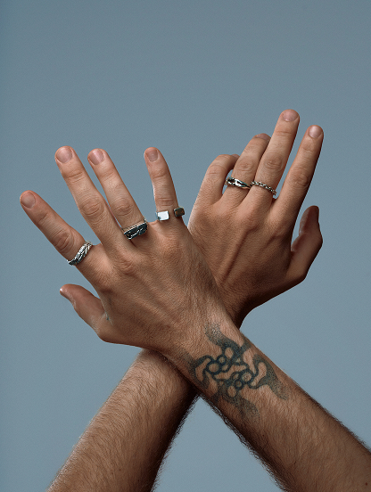 Model wearing handcrafted Indigo silver jewelry from the deep Resonance tale